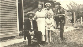 Pickletown - Danford Family- Melvin, Ada, grandchildren Ernest and Clara, and extended family member Sam Synder 1919