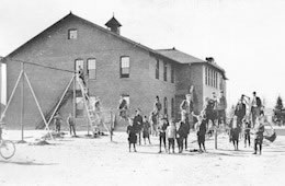 Schools - 1911 Rapp Street with children in play area