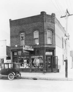 The Littleton Drug Co., 2490 W. Main St. The second floor was occupied by Dr. W.C. Crysler, physician. c.late 1920s.