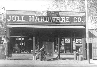 W.I. Edgerton in front of Jull Hardware Co., 2389 W. Main Street. The store was built in 1890, photo c.1907.