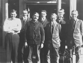Littleton Post Office staff, c.1916. Left to right: Harry Knight; Fred Binner, assistant postmaster; Alex Johnson, R.R. carrier; Earl Downing; William Getschow, R.R. carrier; Edward H. Albertson, Postmaster; Ralph Duncan.