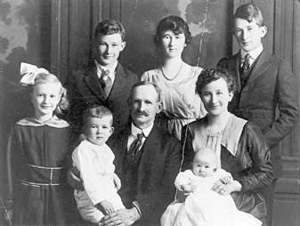 Charles G. Louthan family, c.1918. Left to right, standing: Virginia (Ditsch), Harry, Dora (Fielding), Earl. Seated: Charles C., Charles G. Louthan, Lorena Louthan, Charlotte (Skinner). Eleanor, the last child, was born after this photo was taken.