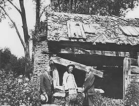 McBroom Cabin with F.S. Byers, Kit Carson, and E.M. Ammons, former governor of Colorado. 1924