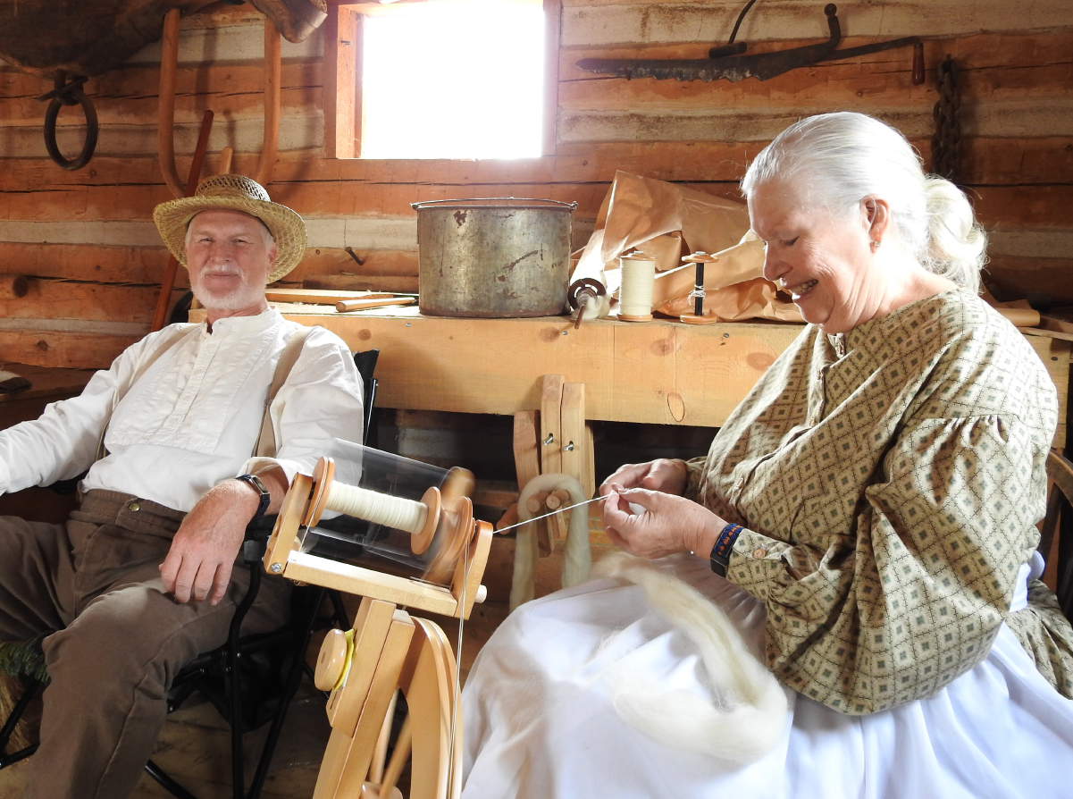 Yarn spinning in 1860s barn.jpg